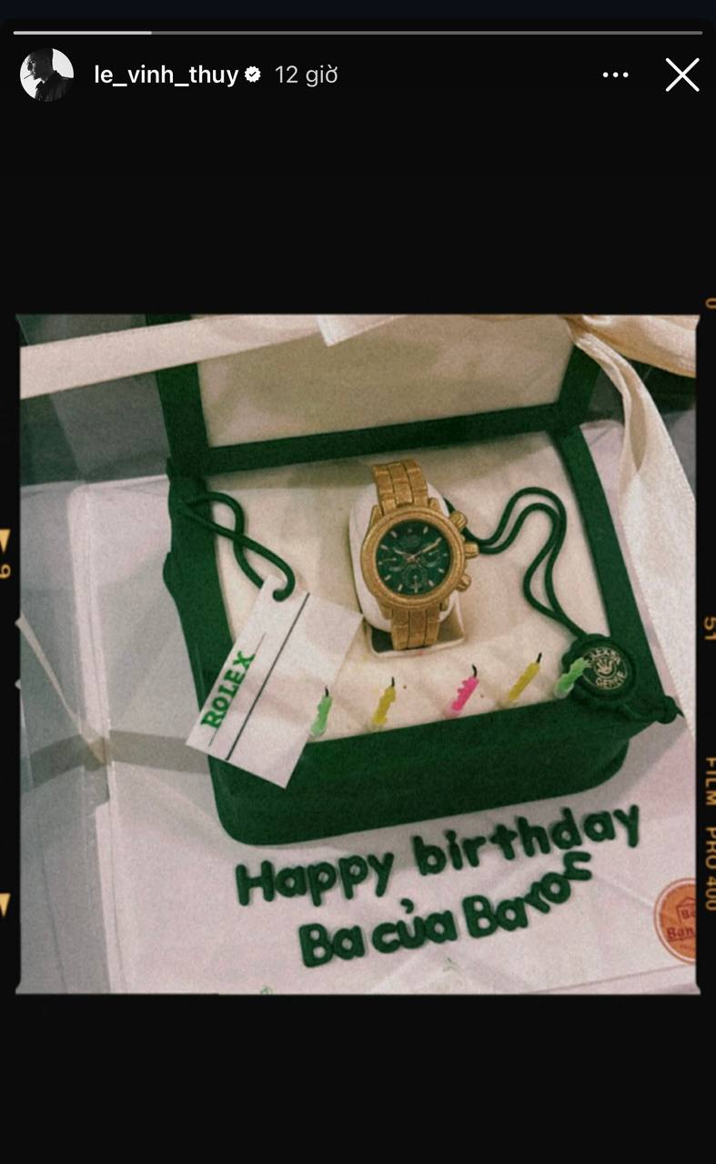 Bánh kem sinh nhật với dòng chữ 'Happy Birthday ba của Baron'